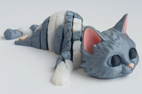 The Joy of Printing in Place: Why the Cute Articulated Cat is a 3D Printing Staple